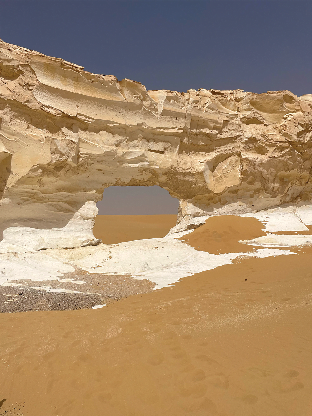 Egyptian Sahara, white desert wind-sculpted limestone formations.